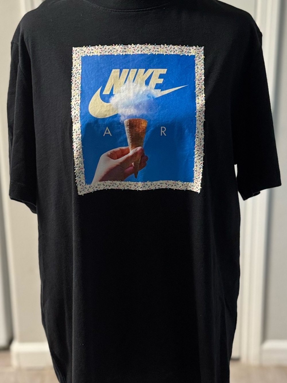 Nike Black Tee with Blue and Gold Ice Cream Graphic